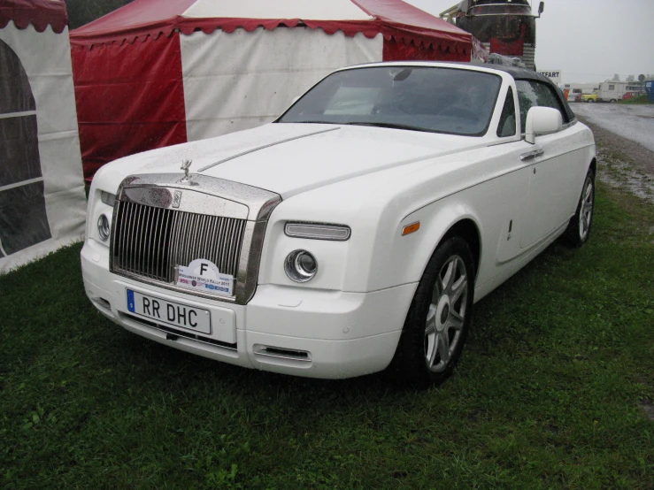 an image of the back end of a rolls royce car