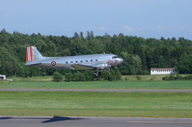 the small plane is taking off from the runway