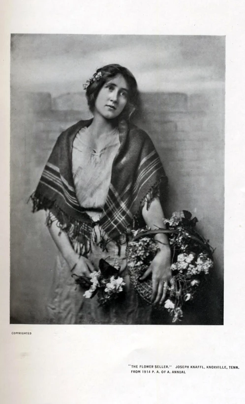 the cover of an old book showing a woman with a shawl and flowers