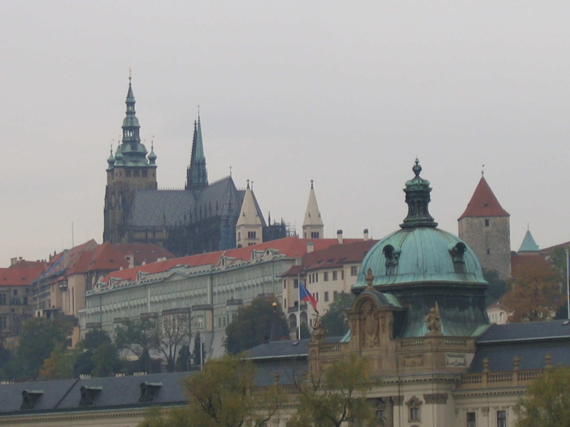 several large buildings are shown against a sky