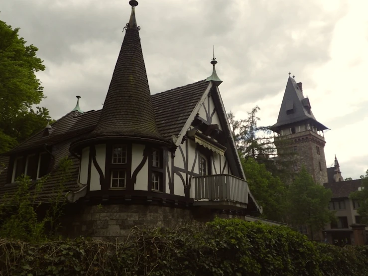 the building has a clock on top that is connected to two other towers