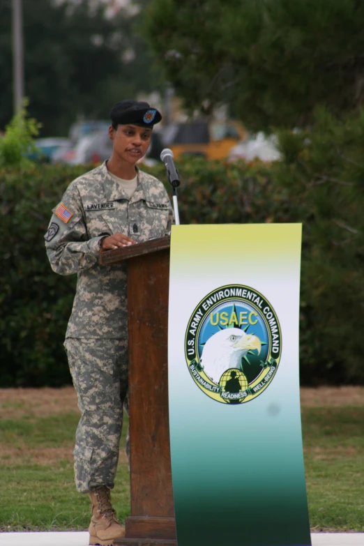 the soldier is giving a speech at the ceremony