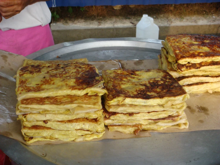 several pancakes sitting on top of a pan on a counter