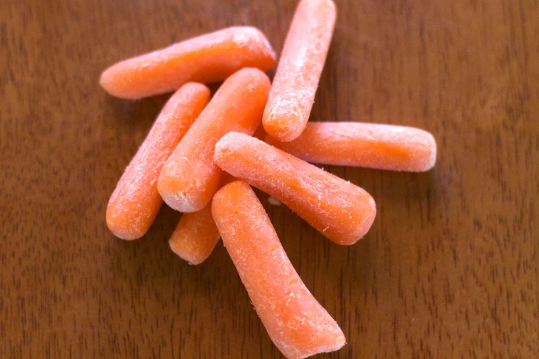 the carrots have been covered with a little bit of sugar