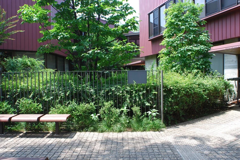 an outside view of a building with a fence