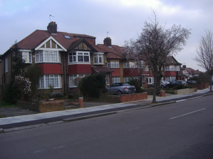 houses line the edge of a road near a residential area