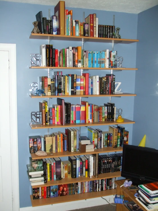 a book shelf that is filled with books