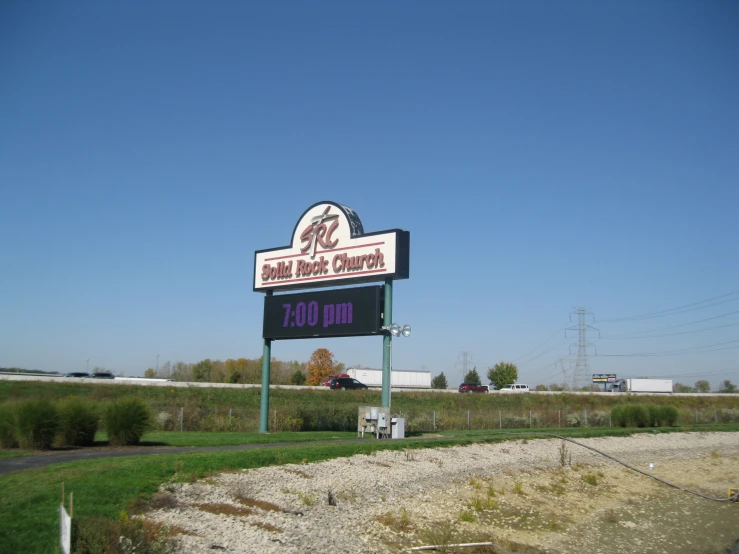 an outside sign for the village music company