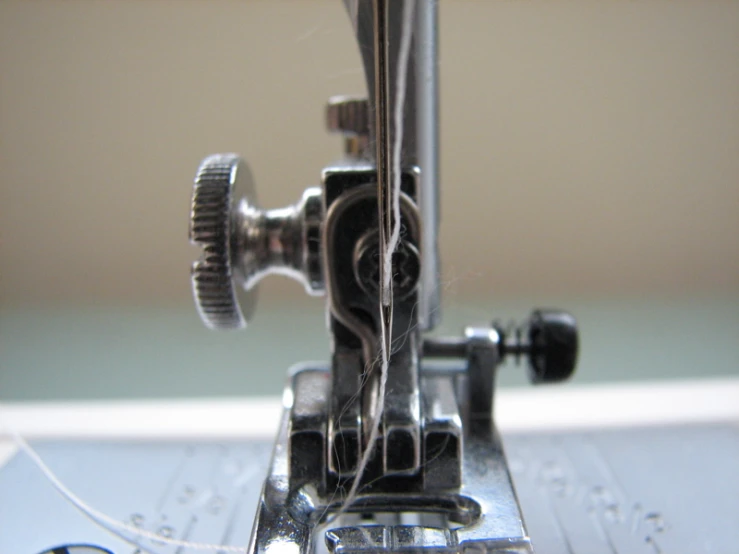 the view of a machine working on a sewing project