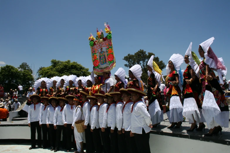 a group of young people standing next to each other