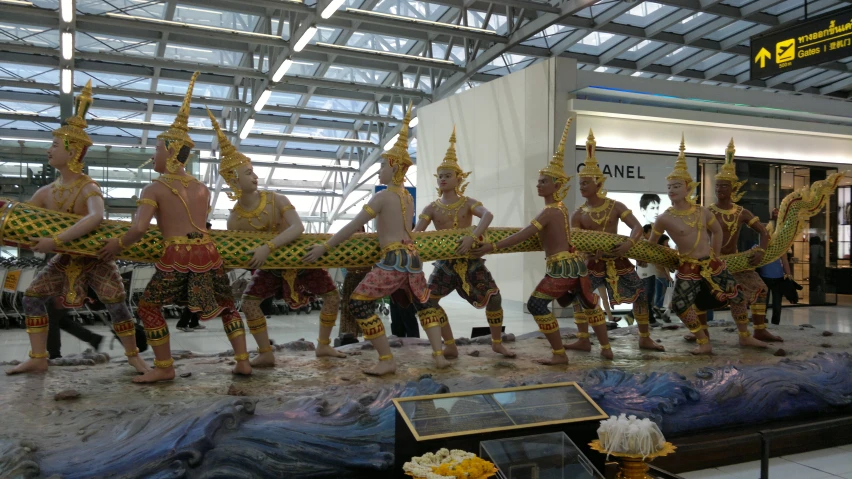 a group of men in elaborate dress dancing