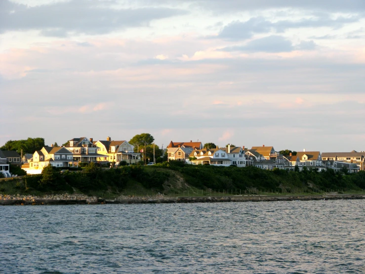 several houses next to a body of water