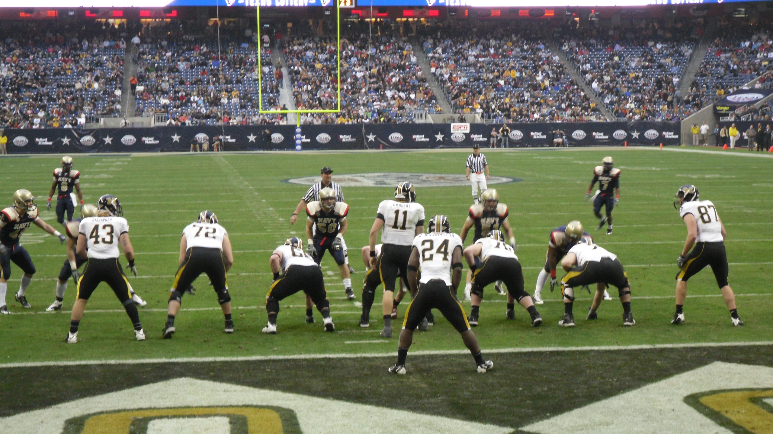 a group of football players is on the field