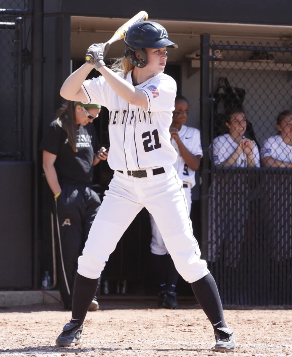 a baseball player waiting for the pitch at home plate