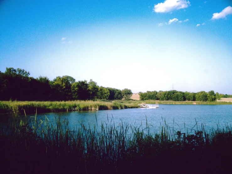 there is a lake with some very pretty blue water