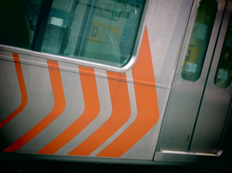 the front of a transit train with its door ajar