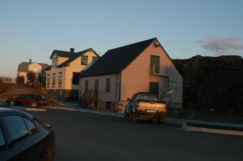 a truck that is parked by a house