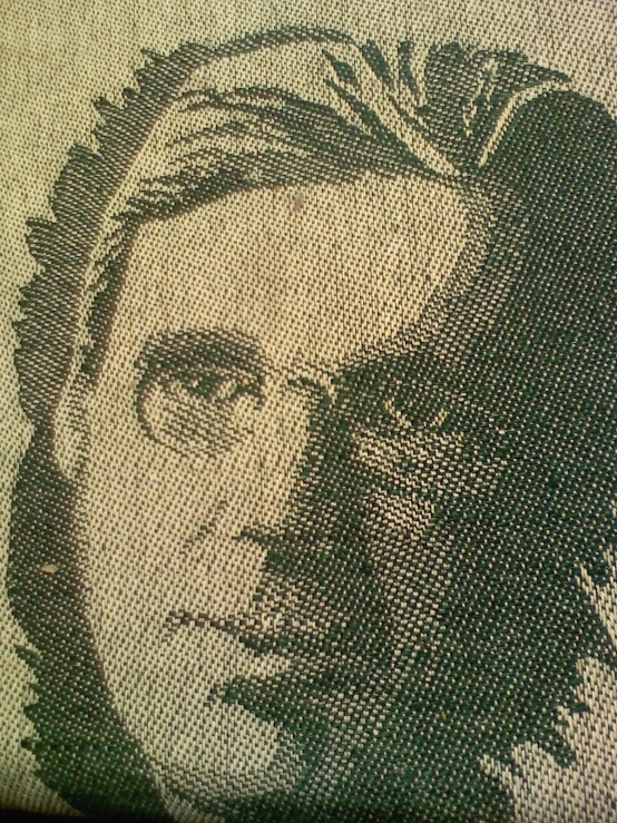 the cover to a fabric with an image of an older woman