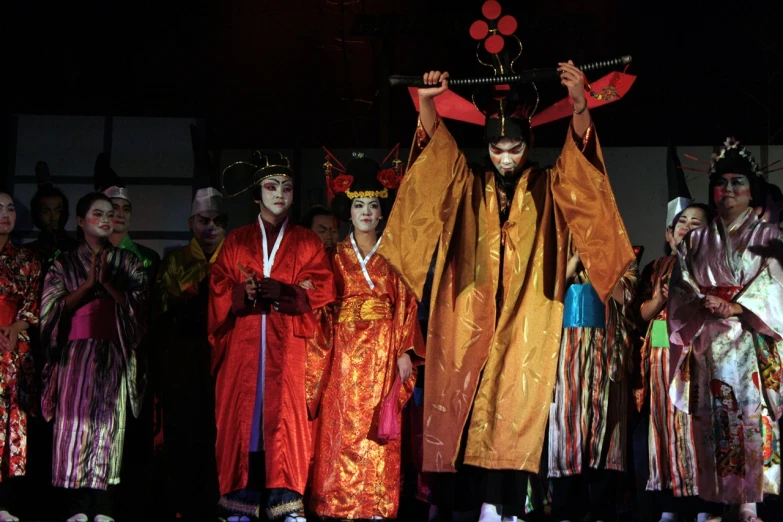 a group of people with costumes and makeup on