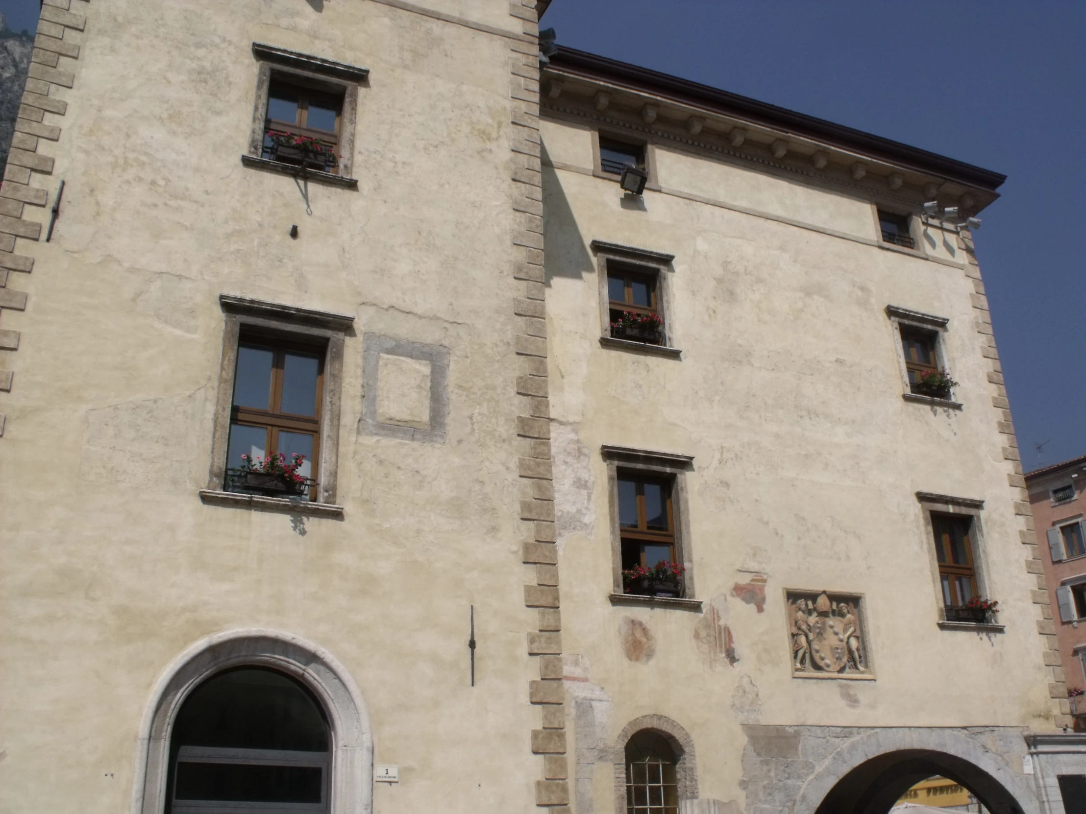 an old building with a clock built into it