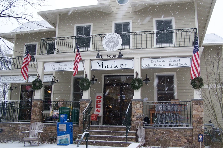 a picture of the front of a store in the snow