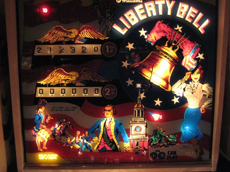 a lit sign for liberty bell with various decorations