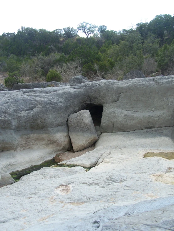 some very large rocks in a small cave