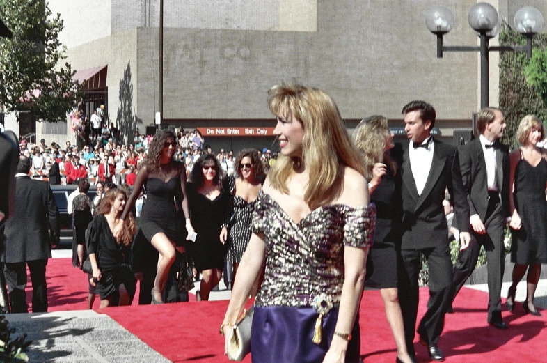 a woman wearing a gown on the red carpet