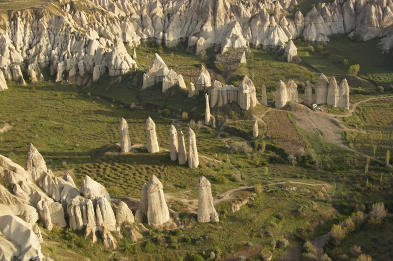 an aerial view of a rock landscape, possibly a forest