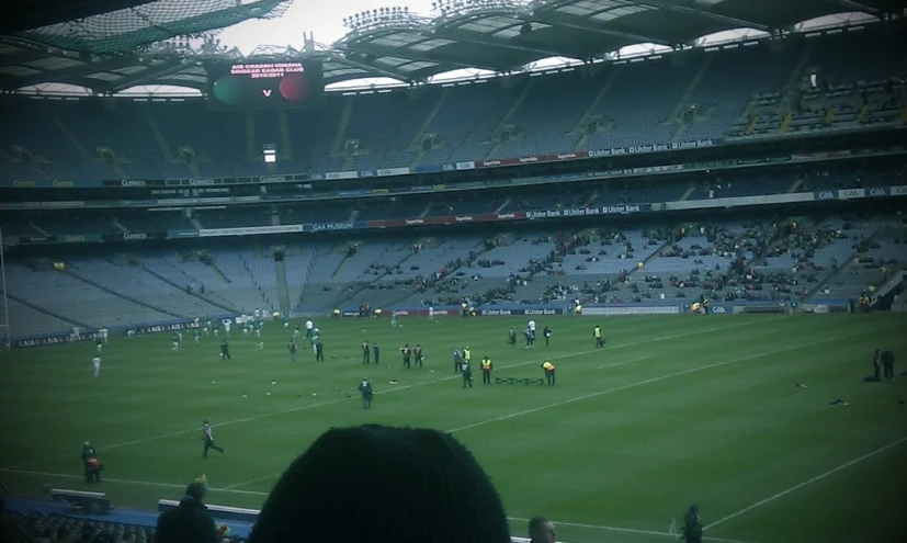 a large group of people at an empty stadium