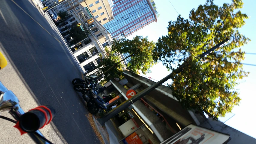 a street scene looking up at the sky