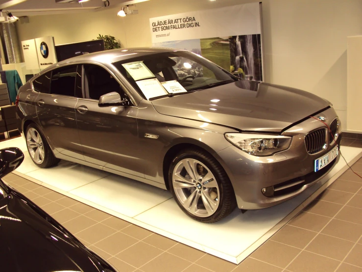 a car that is sitting on display with other cars