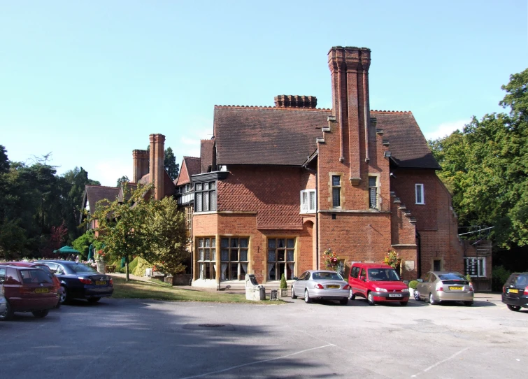 a large brick building with a large fire escape on the top floor