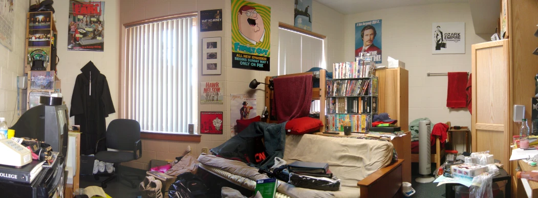 an old dorm room with clutter everywhere