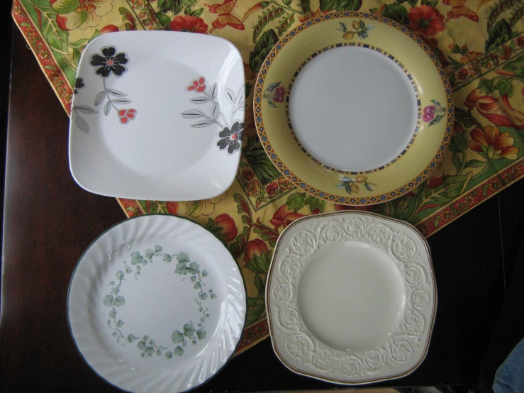 a variety of plates with designs on them