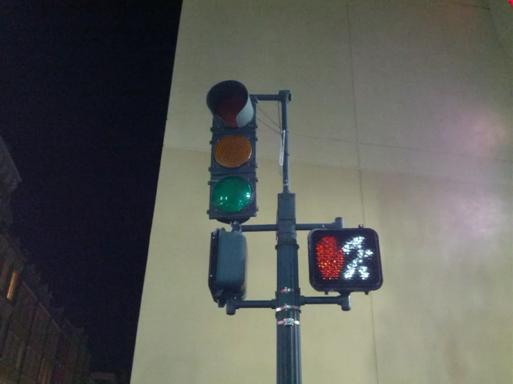 an image of a stop light lit up at night