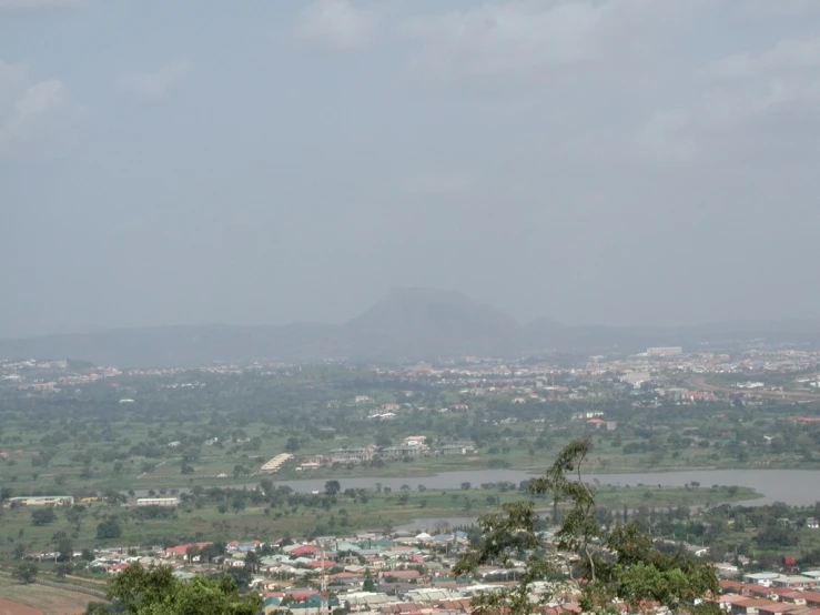 an aerial view of a city and trees