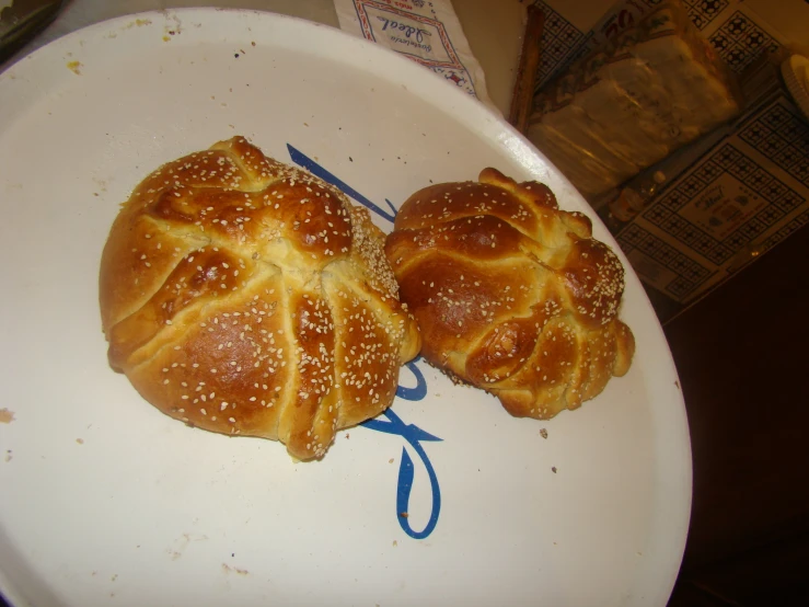 two pieces of bread on a white plate