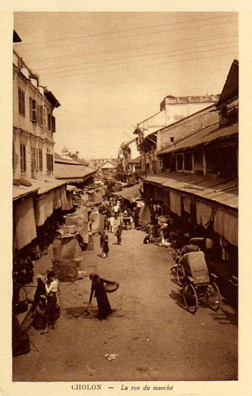 an old black and white po of people in the street