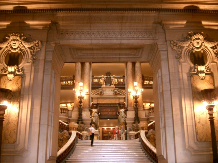 a very big pretty building with some stairs