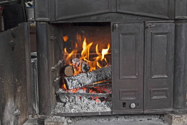 a small oven is shown in a dirty house