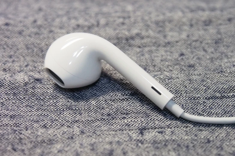 a earphone is connected to an external cord