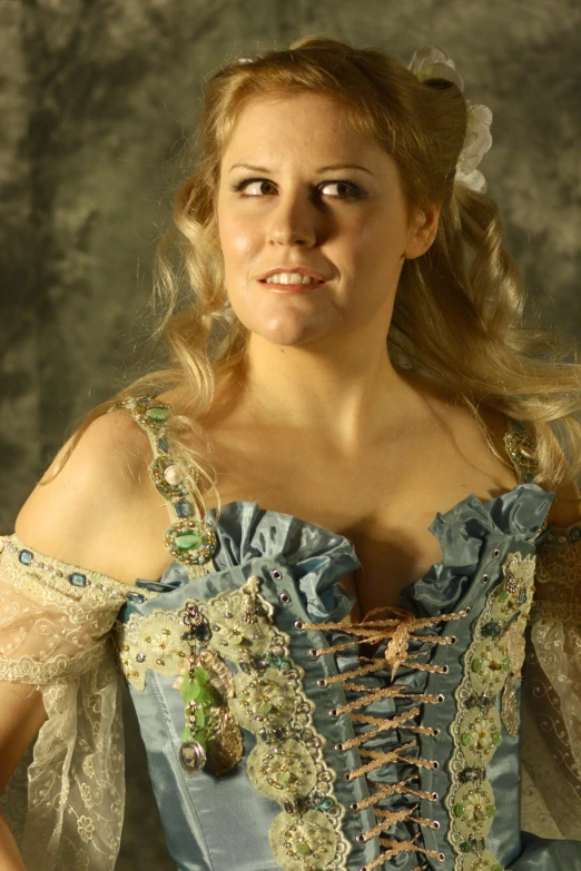 woman wearing blue and white renaissance style dress