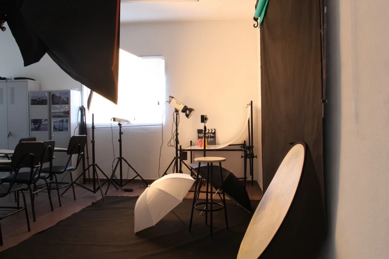 a pograph studio setup of lighting equipment including umbrella