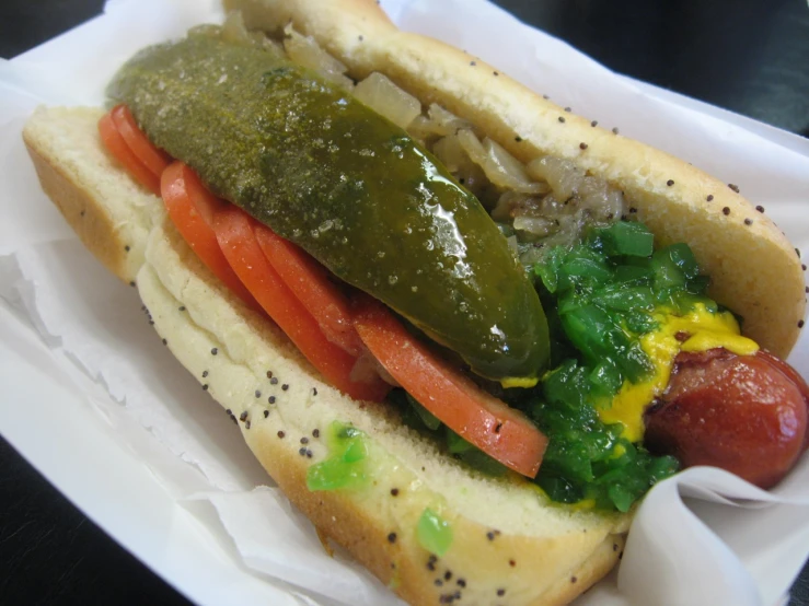 a close up of a  dog with peppers on it