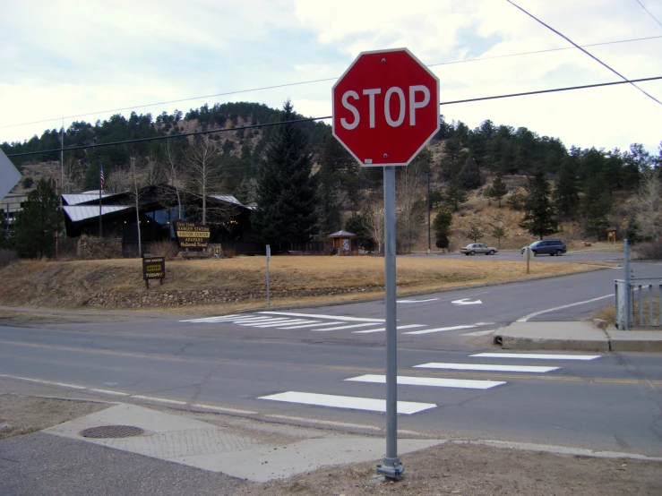 the stop sign is at the intersection of the roads