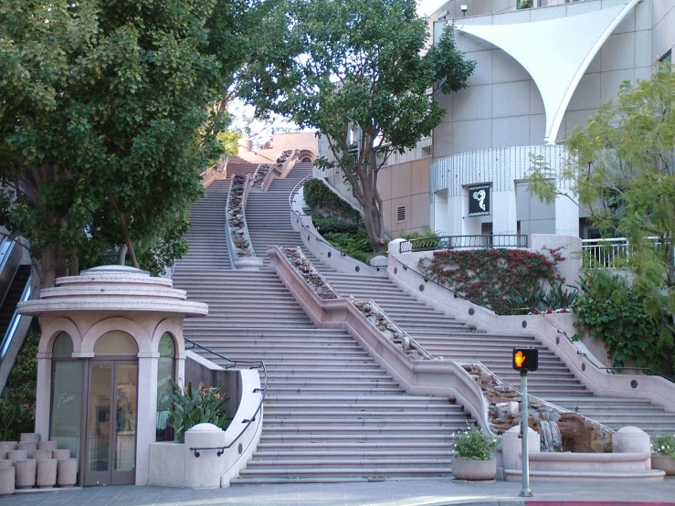 a bunch of stairs down to a large building