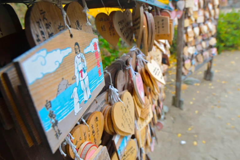 the wooden signs are posted in many places