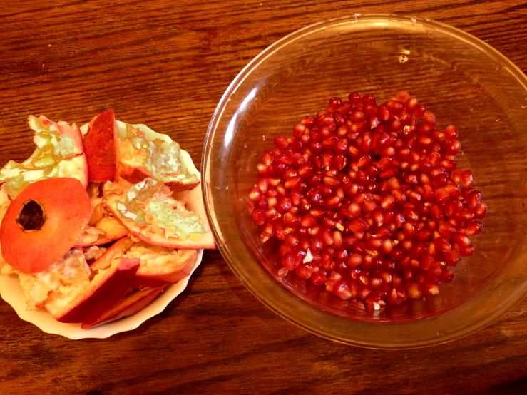 a couple of bowls on a table topped with food