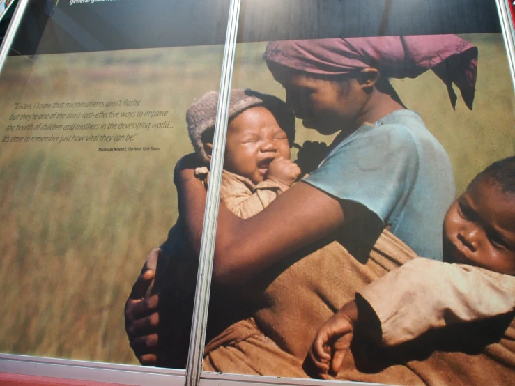 people standing in front of an advertit